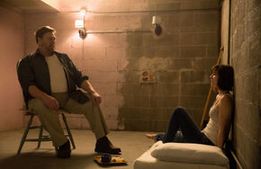 John Goodman and Mary Elizabeth Winstead in 10 Cloverfield Lane