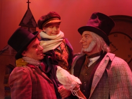 Brad Hauskins, Jordan Schmidt, and Adam Michael Lewis in A Christmas Carol