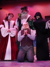 Erin Dickerson, George Schulz, Adam Michael Lewis, and Tristan Tapscott in A Christmas Carol