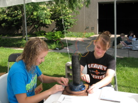 students work on green art