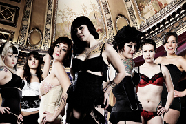 Danielle Colby-Cushman (center) and the women of Burlesque Le' Moustache