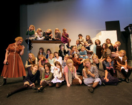 Rachelle Walljasper and ensemble members in Countryside Community Theatre's Annie