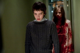 Kodi Smit-McPhee and Chloe Grace Moretz in Let Me in