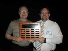 Aaron Randolph III (right) receiving the Michael Kennedy Theatre Scholarship from Michael Kennedy