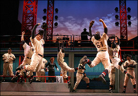 the touring production of Damn Yankees, coming to the Adler Theatre