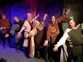 Doug Kutzli, Chris Tracy, Matt Holmes, Wendy Czekalski, Mike Kelly, and Bob Manasco in the District Theatre's Monty Python's Spamalot