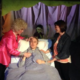 Nancy Teerlinck, Bret Churchill, and Sara Tubbs in the Distict Theatre's A New Brain