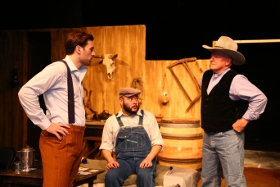 Cody Johnson, Ed Villarreal, and Greg Boulijon in the Playcrafters Barn Theatre's Of Mice & Men