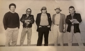 the original Ellis Kell Band lineup: John Burchett, Rick Stoneking, Ellis Kell, Dennis 'Shineboy' Hancq, and Jeff Clark (circa 1990)