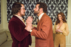 Christian Bale, Bradley Cooper, and Amy Adams in American Hustle