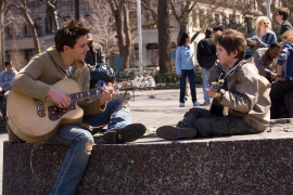 Jonathan Rhys Meyers and Freddie Highmore in August Rush