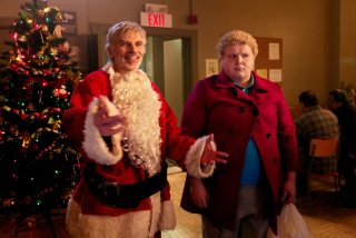 Billy Bob Thornton and Brett Kelly in Bad Santa 2