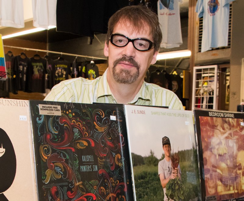 Bob Herrington with some LPs from his Cartouche Records label.