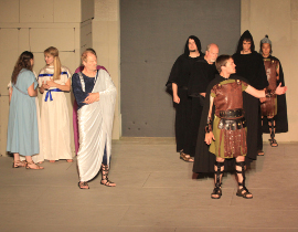 Bob Hanske, Tyler Henning, and ensemble members in Coriolanus