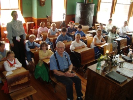 98-year-old Gilbert Ingraham and students at Marshalltown, Iowa's Taylor No. 4