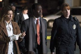 Jennifer Esposito, Don Cheadle, and Kathleen York in Crash