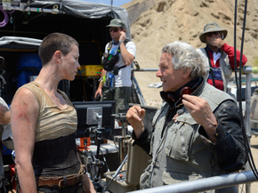 George Miller directing Charlize Theron in Mad Max: Fury Road