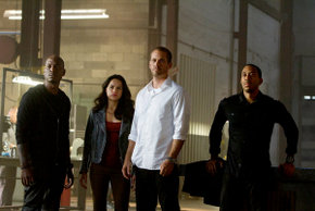 Tyrese Gibson, Michelle Rodriguez, Paul Walker, and Chris Ludacris Bridges in Furious 7