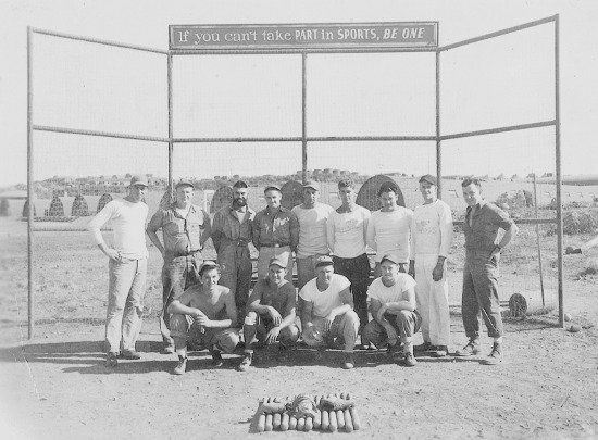 The United States Navy North African Exhibition Baseball Team in 1942. Gene Moore is in the middle of the back row. The United States Navy North African Exhibition Baseball Team in 1942. Gene Moore is in the middle of the back row.