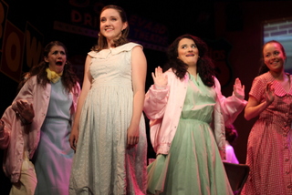 Olivia Schaperjohn, Holly Moss, Whitney Willard, and Gillian Han in Grease