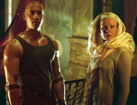Vin Diesel and Judi Dench in The Chronicles of Riddick