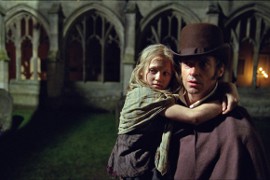 Isabelle Allen and Hugh Jackman in Les Miserables