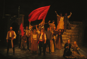 ensemble members in Les Misérables