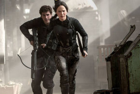 Liam Hemsworth and Jennifer Lawrence in The Hunger Games: Mockingjay - Part 2