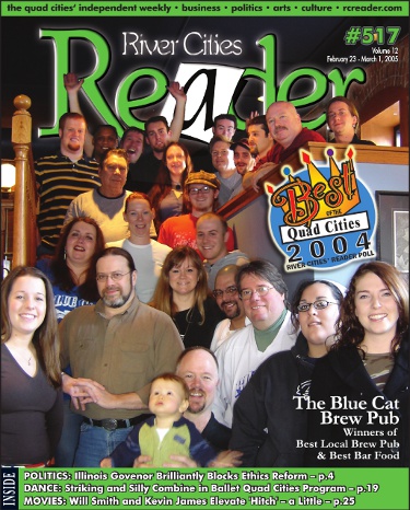 Bob Murdock (bottom center) holding his son Montgomery with his Blue Cat family on a 2005 cover of the River Cities’ Reader