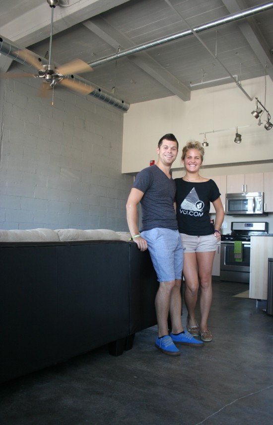 Nathan Carroll and Kelly Komadino in their apartment in the Peterson Paper Company building, to which they moved last month. Carroll moved from the Crescent Lofts, where he'd lived for four years.