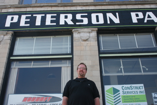 Developer Joe Erenberger in front of the Peterson Paper Company building