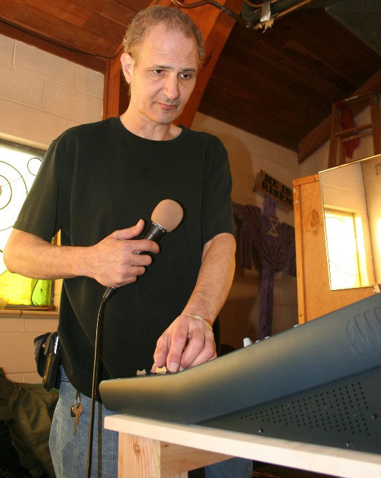 Rob Cimmarusti working on an audio-equipment installation at Progressive Baptist Church in Davenport on January 4, 2013.