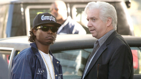 Jason Mitchell and Paul Giamatti in Straight Outta Compton