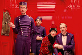 Paul Schlase, Tony Revolori, Tilda Swinton, and Ralph Fiennes in The Grand Budapest Hotel