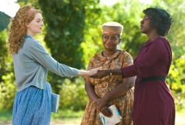 Emma Stone, Octavia Spencer, and Viola Davis in The Help