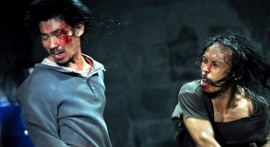 Doni Alamsyah and Yayan Ruhian in The Raid: Redemption
