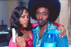 Aunjanue Ellis and Eddie Griffin in Undercover Brother