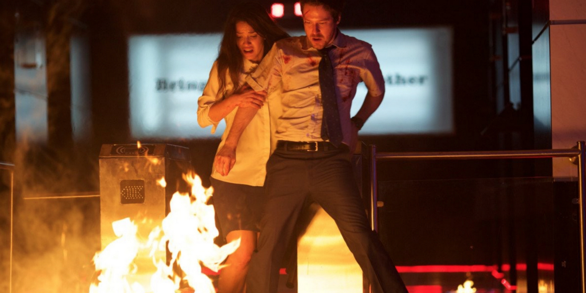 Adria Arjona and John Gallagher Jr. in The Belko Experiment