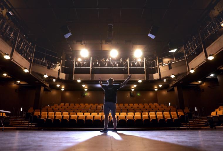 Keenan Odenkirk on the mainstage of Augustana College's Kim & Donna Brunner Theatre Center, photo by Paul Colletti