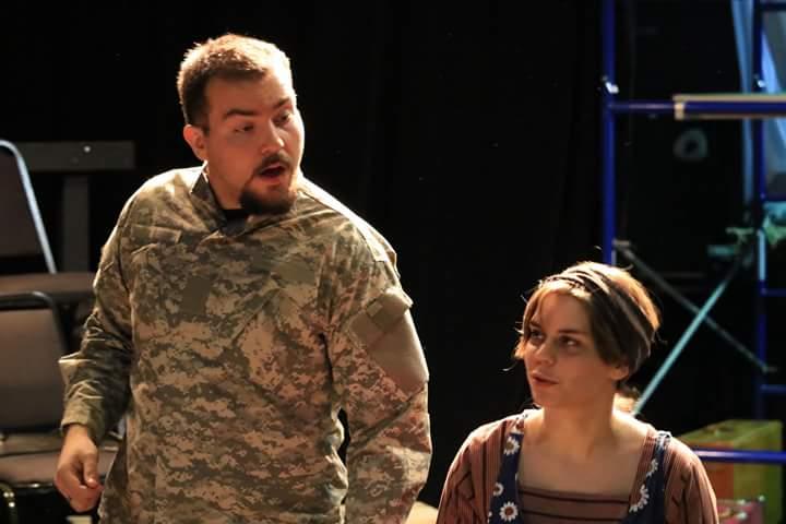 Payton Brasher and Mattie Gelaude in The Caucasian Chalk Circle