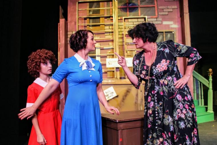 Emily Winn, Sara Tubbs, and Julie Wilson Funk in Annie