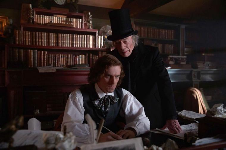 Dan Stevens and Christopher Plummer in The Man Who Invented Christmas