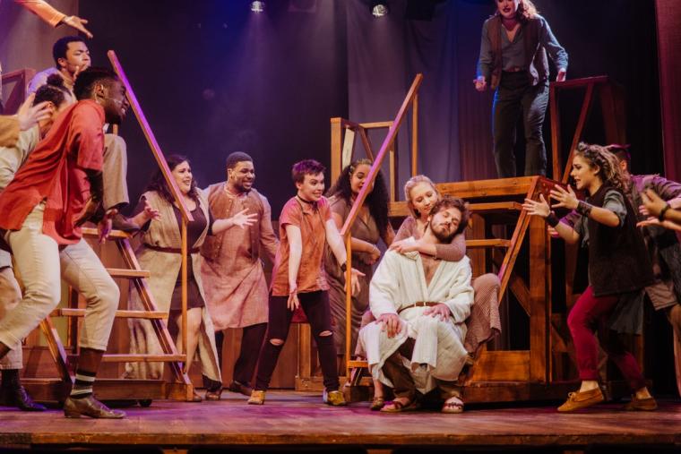 Claire Soulier, Ben Cherington, and ensemble members in Jesus Christ Superstar