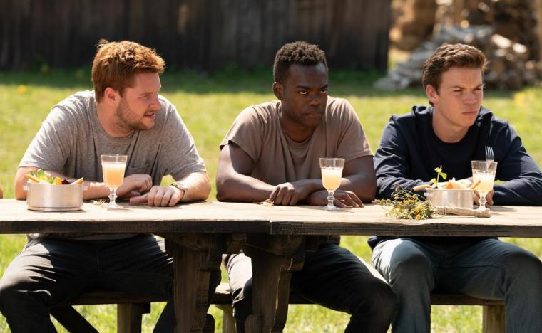 Jack Reynor, William Jackson Harper, and Will Poulter in Midsommar