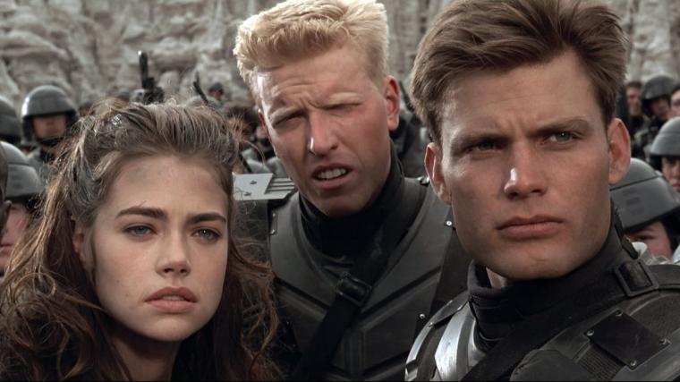 Denise Richards, Jake Busey, and Casper Van Dien in Starship Troopers