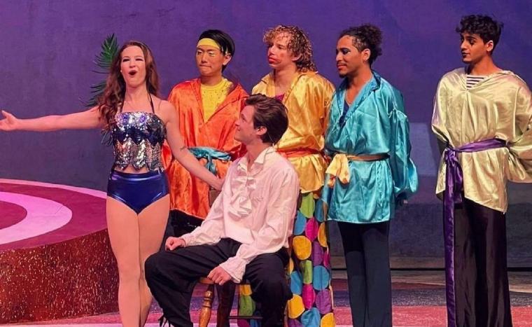 Megan Graal, Jack Hale, and ensemble members in Pippin