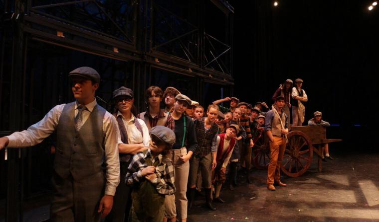 ensemble members in Newsies: The Musical