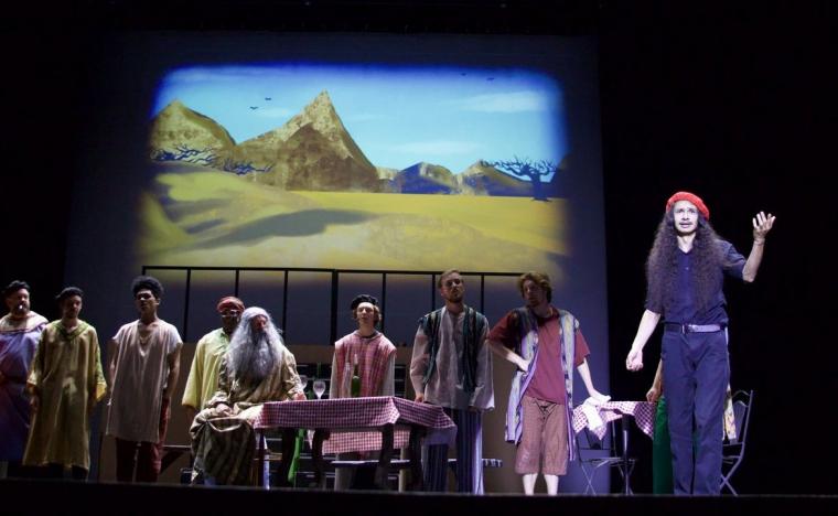 Ira Francisco and ensemble members in Joseph & the Amazing Technicolor Dreamcoat