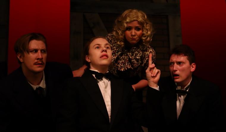 Will Crouch, Roger Pavey Jr., Sarah Walton, and Aiden Lenehan in Augustana College's The 39 Steps