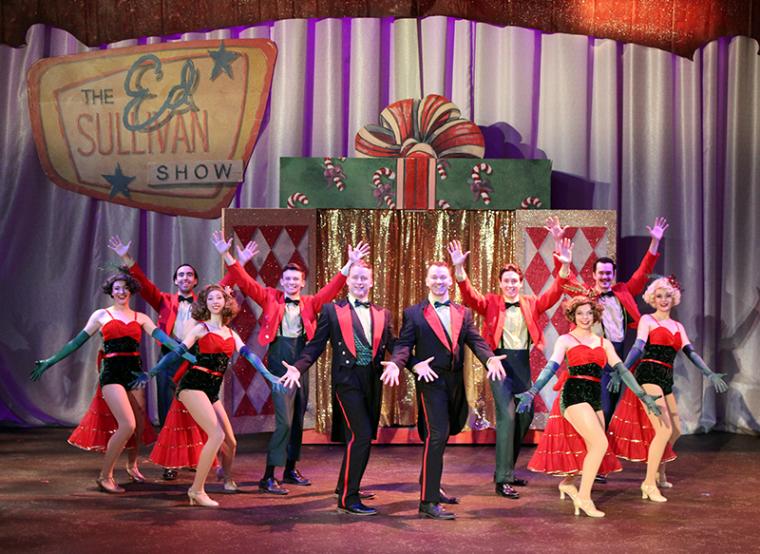 Bobby Becher, Kyle DeFauw, and ensemble members in the Circa '21 Dinner Playhouse's Irving Berlin's White Christmas